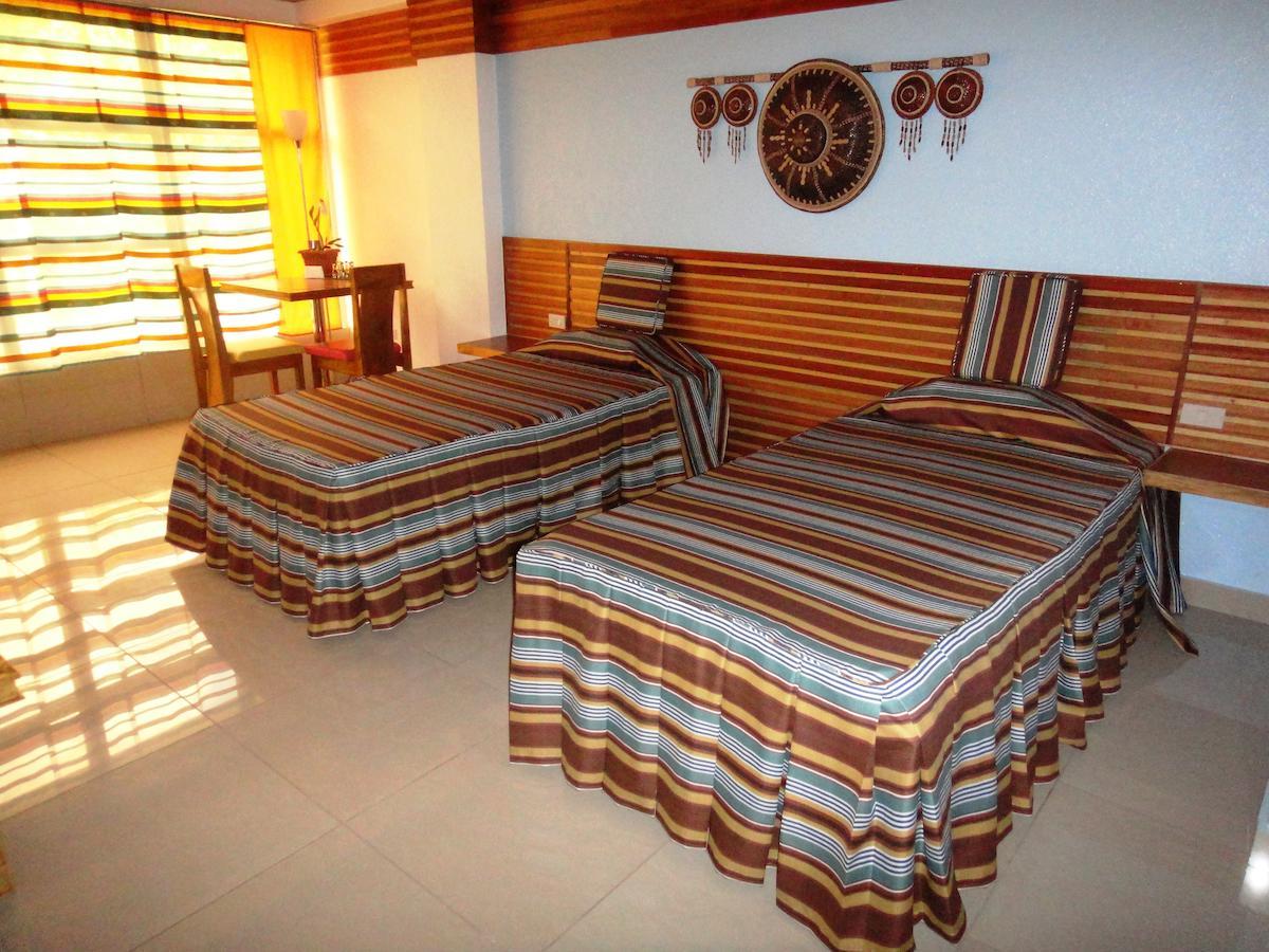 Citi Hotel Hilongos Quarto foto